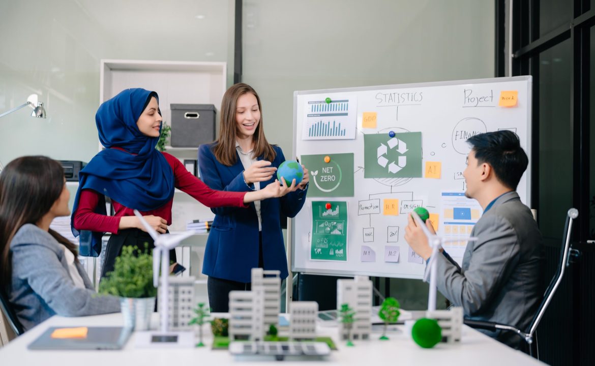 Group of alternative energy engineers discussing a project with