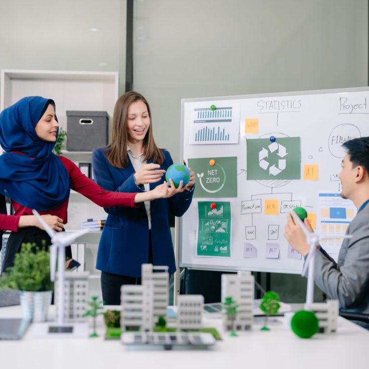 Group of alternative energy engineers discussing a project with