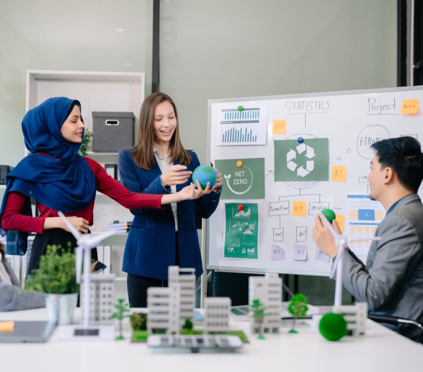 Group of alternative energy engineers discussing a project with